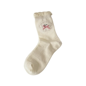 Cream knit mid-calf socks featuring cartoon dog embroidery and pink bow lace cuffs