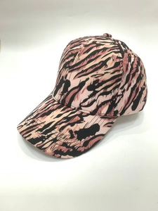 Close-up of pink and black zebra print baseball cap with a six-panel crown design
