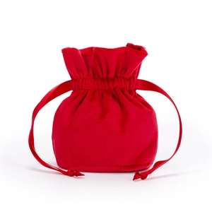 Detail of red velvet drawstring gift bag with elegant ribbon closure and round bottom