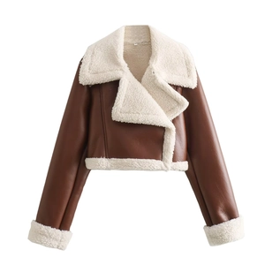 Detail of cropped brown PU jacket with cream faux shearling lining and collar