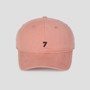 Close-up of cotton baseball cap with number 7 embroidery and reinforced stitching
