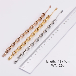 Minimalist stainless steel chain bracelets in gold, silver, and rose gold with size ruler