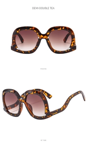 Front and 45-degree side view of oversized tortoiseshell sunglasses in demi-double tea