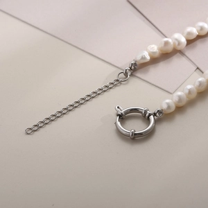 Baroque freshwater pearl necklace with silver spring clasp and elegant metal extension chain
