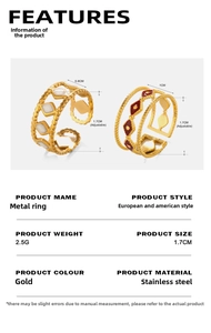 Detailed view of adjustable stainless steel rings with white and red enamel geometric inlay