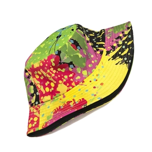 Detailed close-up of vibrant tie-dye graffiti bucket hat with reinforced stitching