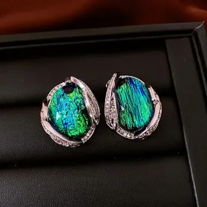 Vintage silver needle earrings with blue-green gradient resin stone and diamond halo