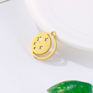 Polished gold hollowed star and moon moon pendant necklace in a minimalist stainless steel style