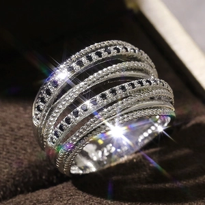 Intertwined multi-layer S925 silver ring with black and white pavé cubic zirconia