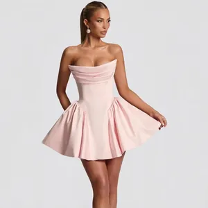 Pink strapless satin mini dress with elegant pleated bodice and voluminous puff skirt