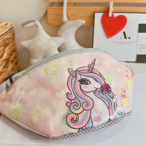 Close-up of pink unicorn kids waist bag with rainbow gradient and glitter mesh fabric