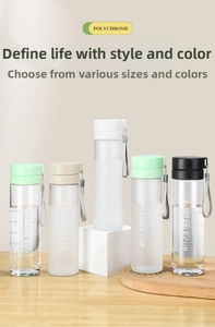 Various colored portable sports water bottles with carrying straps on display