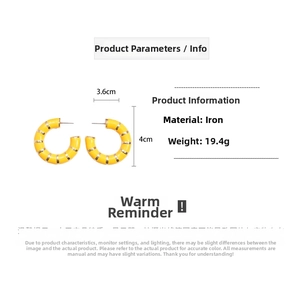 Detailed view of yellow C-shaped hoop earrings with gold stripes, 3.6x4cm iron material