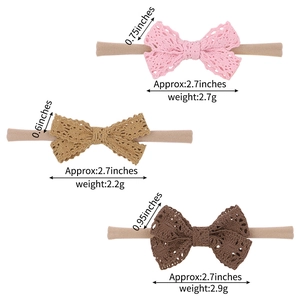 Three-pack of baby nylon headbands with lace crochet bows in pink, beige, and brown colors