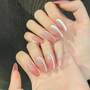 Pink gradient cat-eye handmade press-on nails in long almond shape for manicure