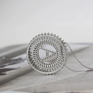 Macro shot of silver pendant necklace with sparkling letter A and micro-pave zirconia