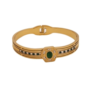 Bracelet en acier inoxydable doré avec verre émeraude et rayures en émail noir