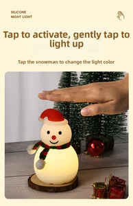 Detail of tapping function to switch light colors on the snowman silicone night light