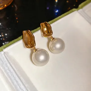 Elegant French style gold lava texture earrings with large round white pearls