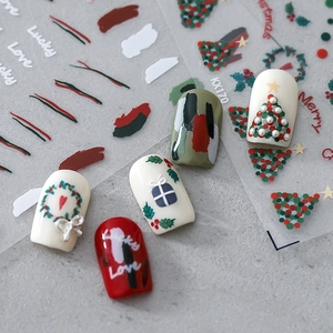 Stickers ongles 5D de Noël avec sapins rouges et verts, couronnes et motifs de fêtes