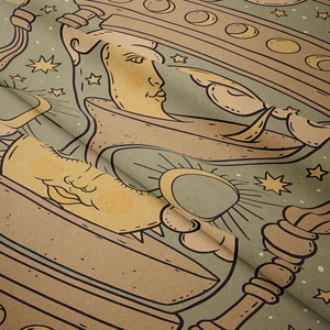 Close-up of celestial moon and stars hand-drawn pattern on bohemian fabric tapestry