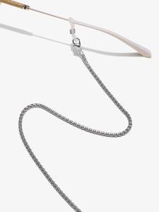 Detail of silver box chain sunglasses strap with anti-slip silicone loops and lobster clasp