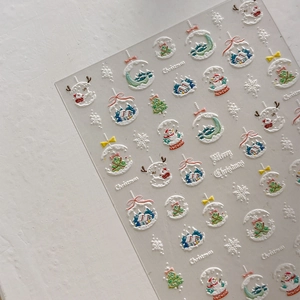 5D embossed Christmas nail art stickers featuring white snowflakes and colorful deer motifs