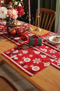 Detailed Christmas table runner and placemats with snowflake jacquard in festive red