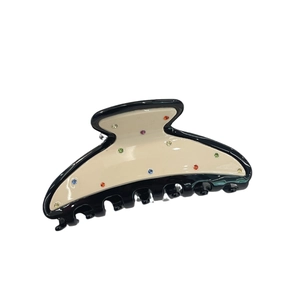 Minimalist acetate hair claw clip in black and beige with colorful rhinestones
