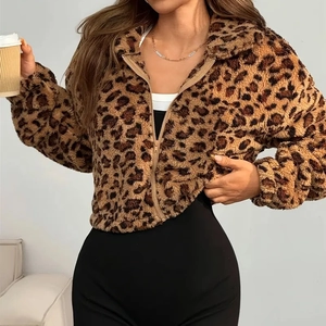 Detail shot of the plush faux shearling texture on leopard print zip-up jacket