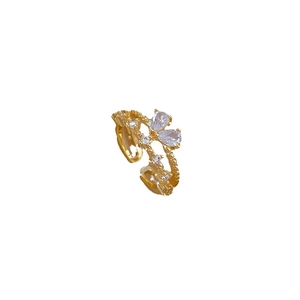 Adjustable gold butterfly ring with pear-cut cubic zirconia and beaded edge details