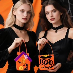 Orange felt Halloween gift bags with Boo text and ghost designs for party decorations