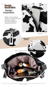 Detail view of cow print tote bag showing internal compartments and zipper pockets