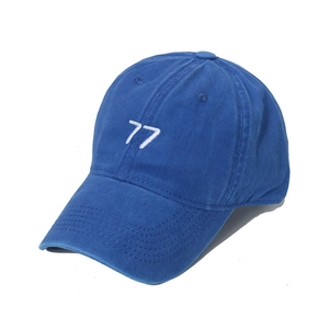 Vintage navy blue washed cotton baseball cap with white 77 embroidery on front