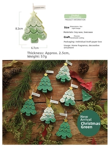 Macro detail of handmade green Christmas tree candle with soy wax and size dimensions
