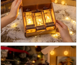 Three-piece Christmas lantern set with snowman and reindeer patterns in gift box