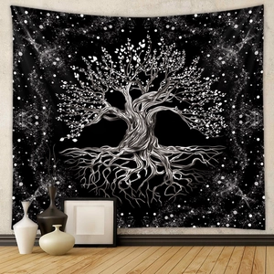 Detail of Tree of Life tapestry with white celestial patterns on a black fabric background
