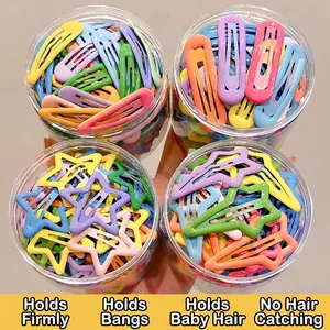 Colorful star-shaped BB hair clips for kids in four transparent storage jars