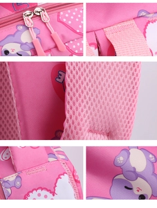 Detail view of pink backpack featuring breathable mesh padding and reinforced stitching