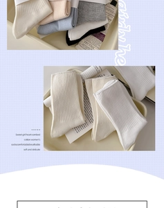 Detailed view of pastel combed cotton socks with vertical ribbed texture and packaging