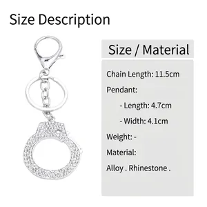 Hip hop style handcuff keychain with sparkling white rhinestones and silver finish