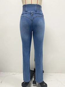 Rear view of high-waisted stretch skinny jeans in dark blue on a mannequin