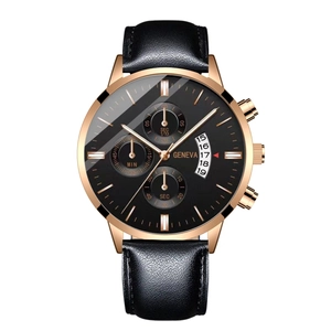 Detailed close-up of a men's quartz watch with black leather strap and gold-tone chronograph dial