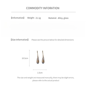 Detail view of long glass teardrop earrings with dimensions and product specifications