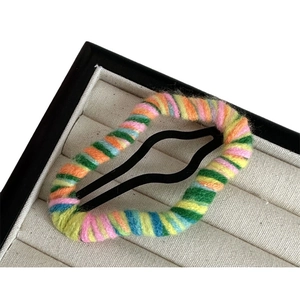 Cloud shaped crochet hair clip wrapped in colorful striped yarn for women's hairstyle