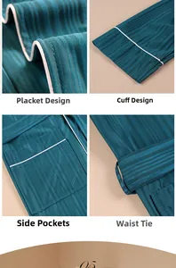 Detail of dark teal robe featuring white contrast piping, side pockets, and tie belt