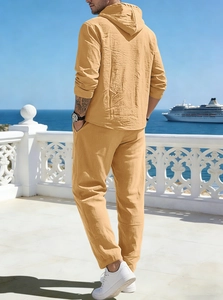 Macro view of ginger linen fabric texture and hooded design on men's two-piece casual set