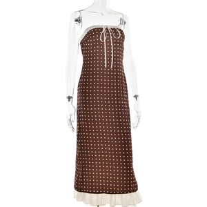 Detail of brown polka dot tube dress with white lace trim and drawstring feature