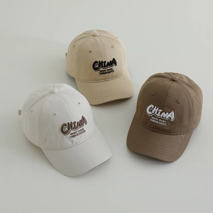 Set of three cotton baseball caps for kids with embroidery in beige khaki and brown colors