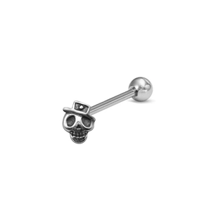 Macro detail of skull-shaped tongue ring with a hat design and polished steel finish